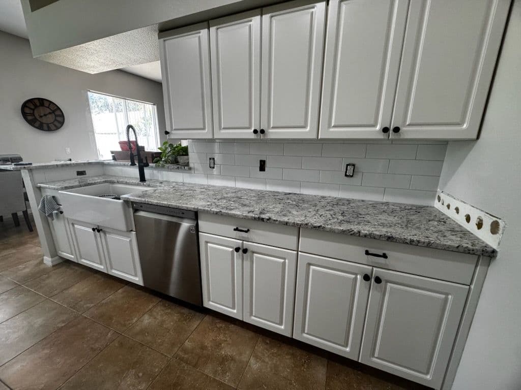 Sleek White Kitchen Backsplash Transformation image
